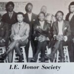 Louis "L Dog" Brown (third from left)